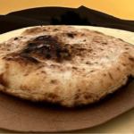 Discover Berber Pizza, also known as Medfouna