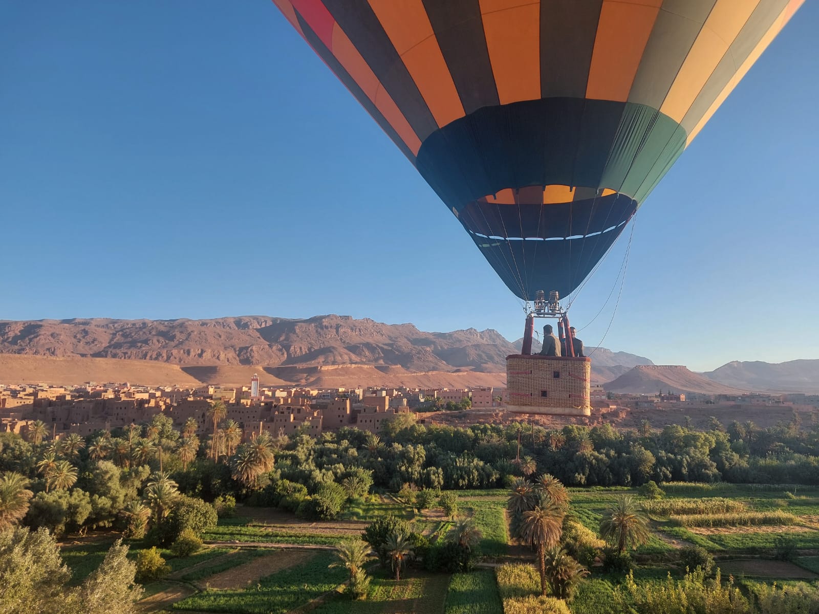 Enjoy a scenic hot air balloon ride over Tinghir Oasis. Witness breathtaking views of palm groves, valleys, and the High Atlas mountains from above.